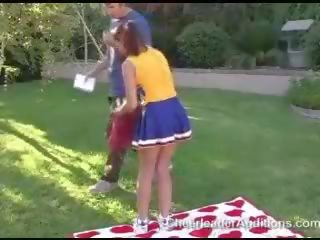 Sexy sexy redhead cheerleader showing tits