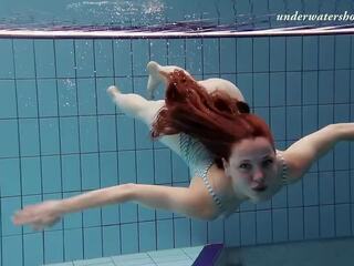 Libidinous Czech deity Salaka swims nude in the Czech pool