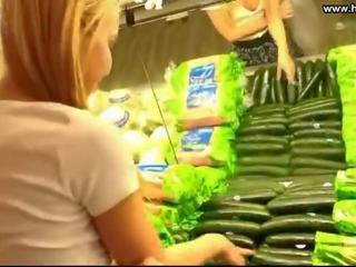 Young woman Fucks Cucumber in Public Supermarket